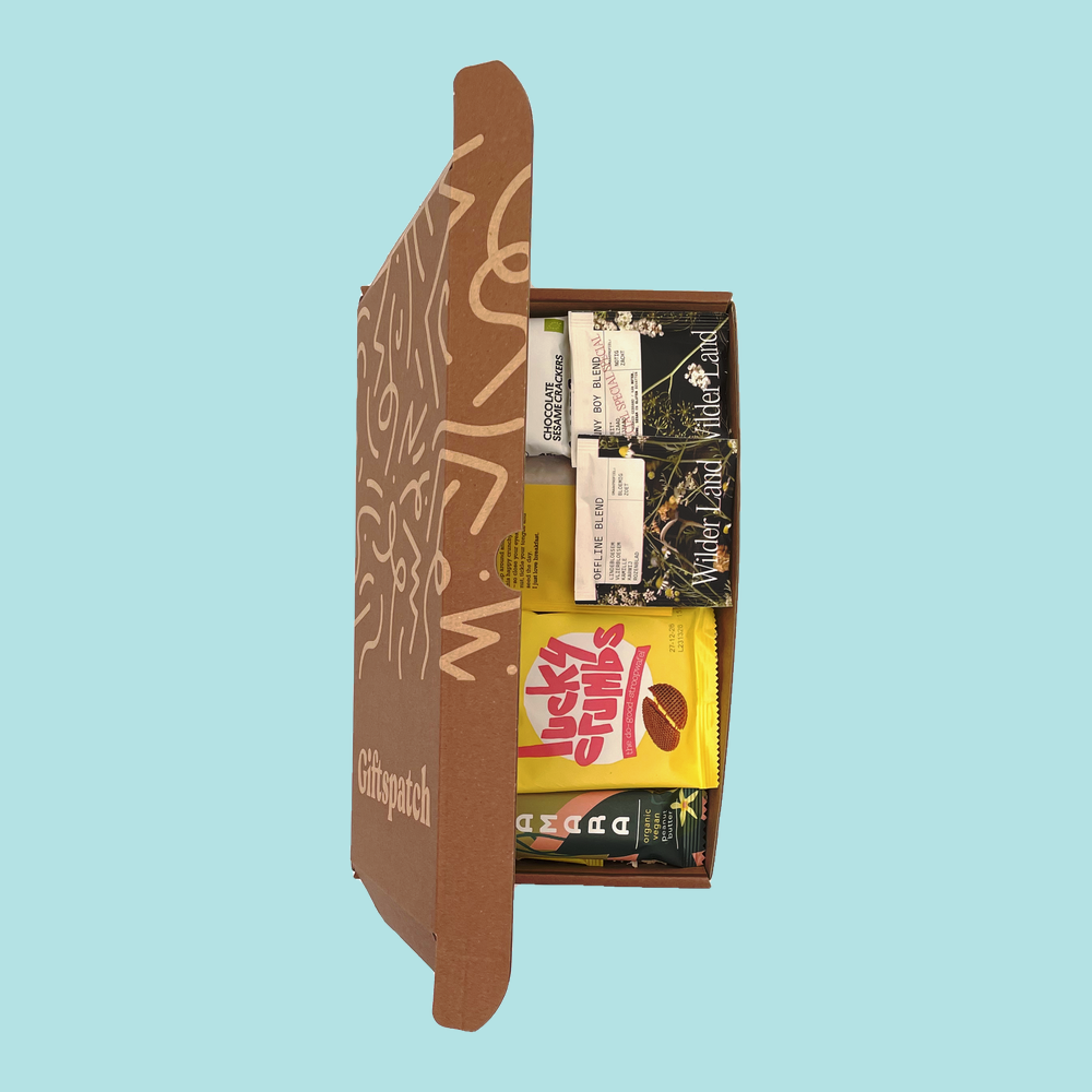Active Box stood upright with the lid open, showing the coffee drip bags and single-serve snacks