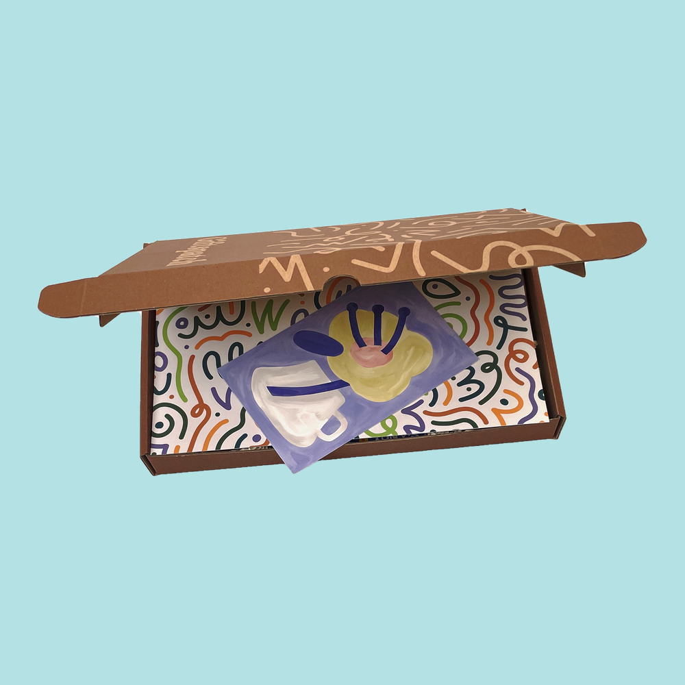 Active Box open with a printed gift card resting on the patterned tissue liner